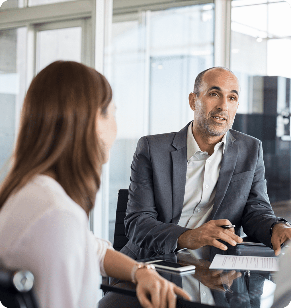 Man and woman in corporate meeting